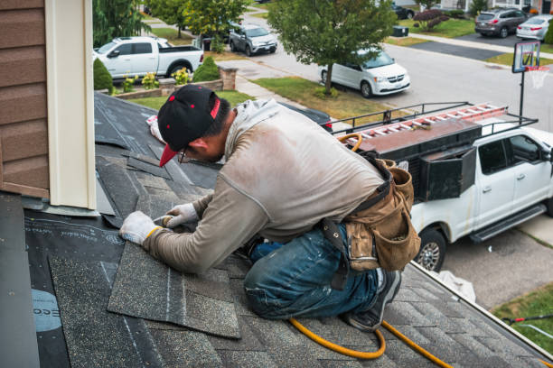 Professional Storm Damage Roof Repair technician working in La Pine, OR